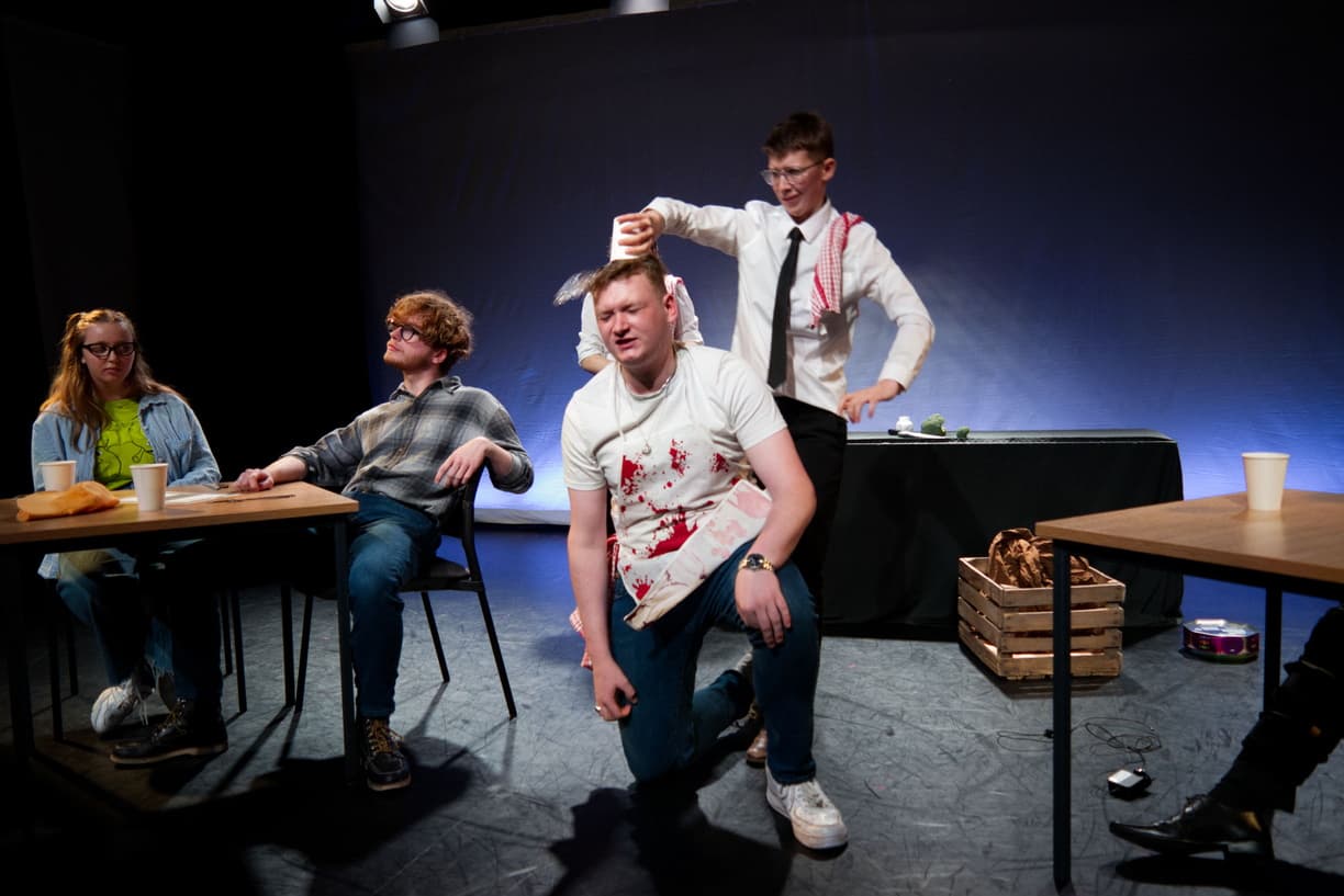 Picture of a performance in a room that looks like Avon Drama Studio